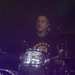 Pure Genius drummer performing live on stage