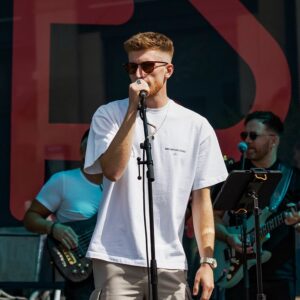 Jack performing live with Pure Genius at Kettering Festival